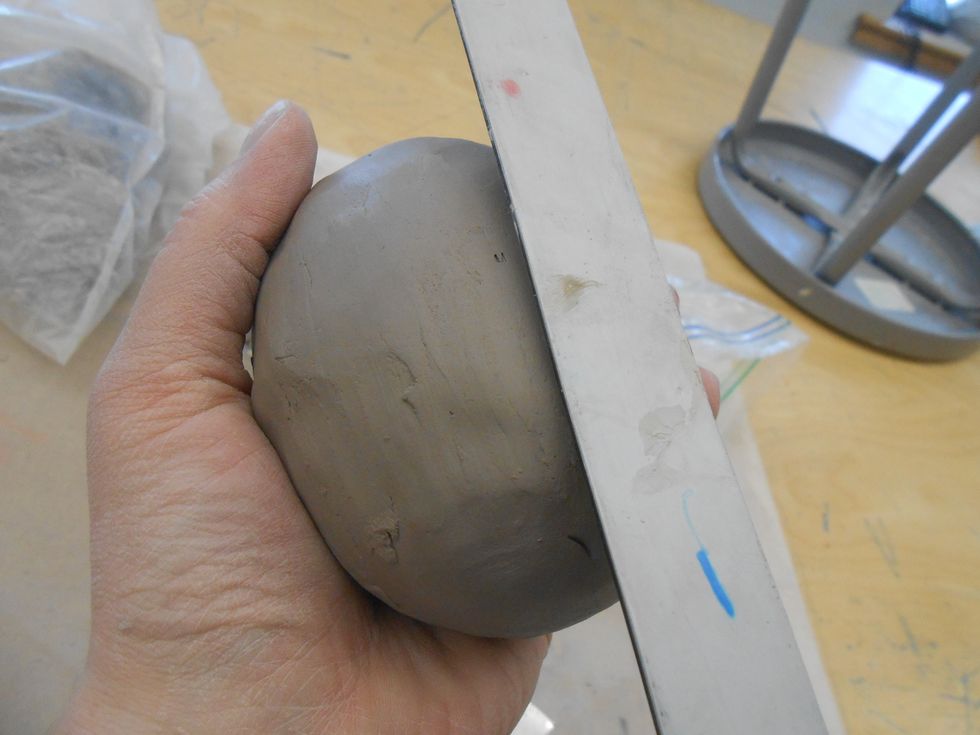 gently paddle the surface to smooth and get desired form (egg like or sphere like)