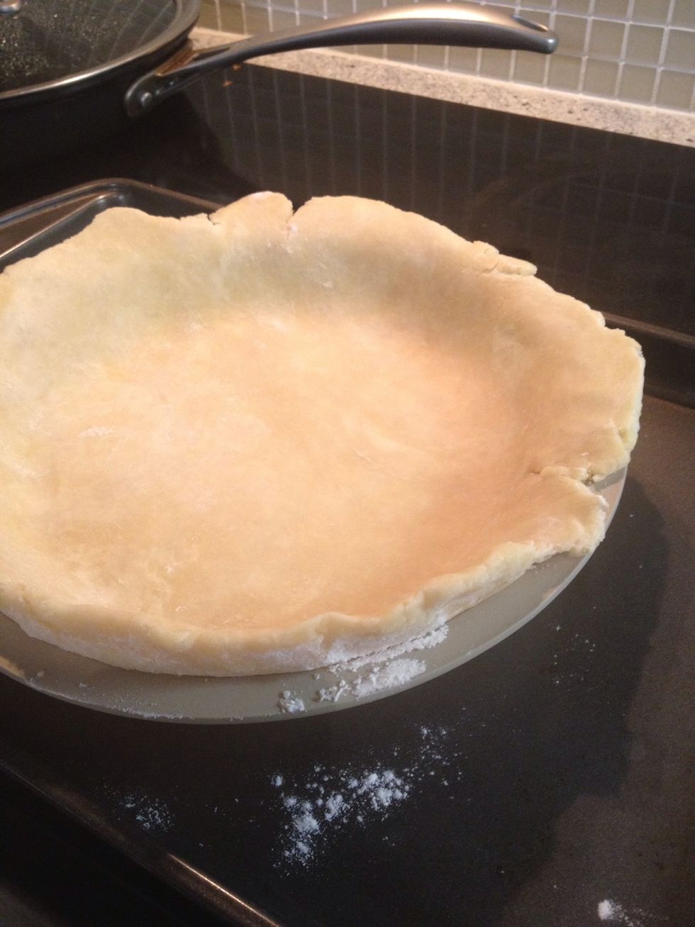 Gently pick up the dough and lay it flat in your pie dish (avoid air bubbles). No need to grease the dish as you've got plenty of butter in the dough already! Fill it with your pie filling
