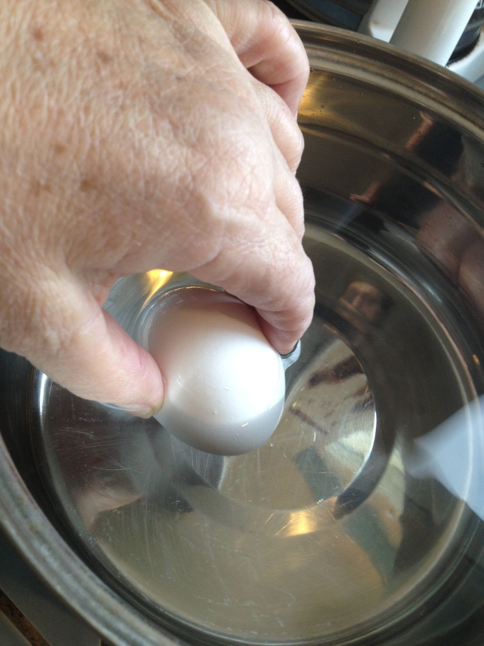 Gently place your eggs in one layer in the pot. Eggs that are at least a few days old work best. Fresh eggs are harder to peel. Go figure!