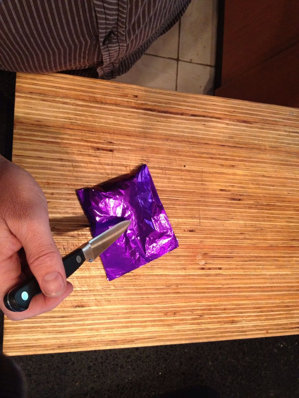 Gently poke a couple of holes in the foil