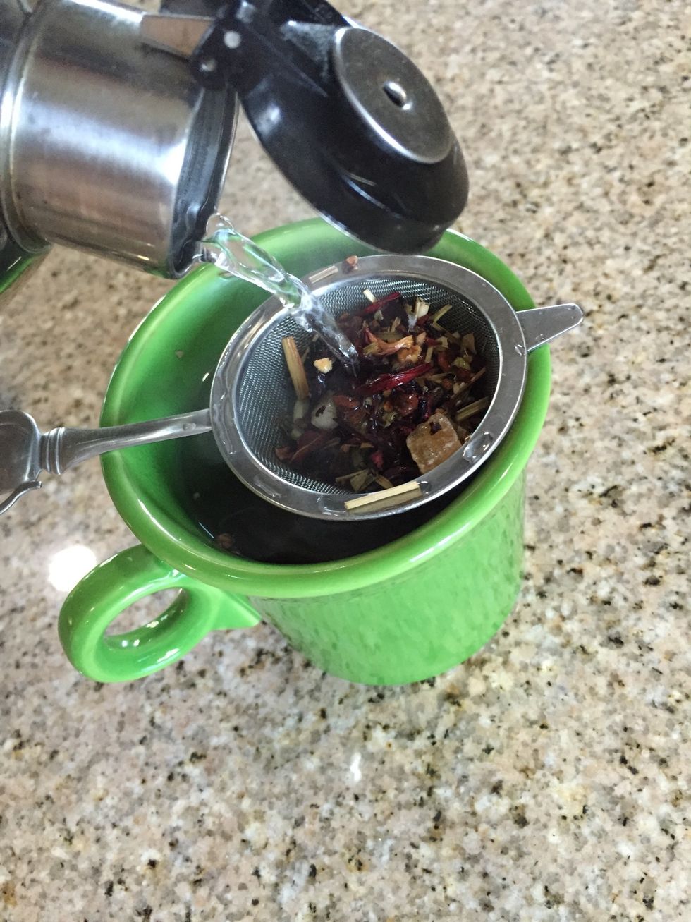 Gently pour water directly over tea leaves.