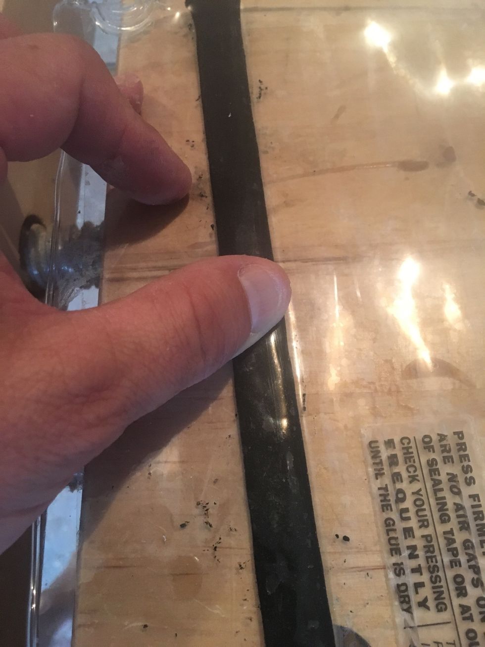 Gently press sealing tape.