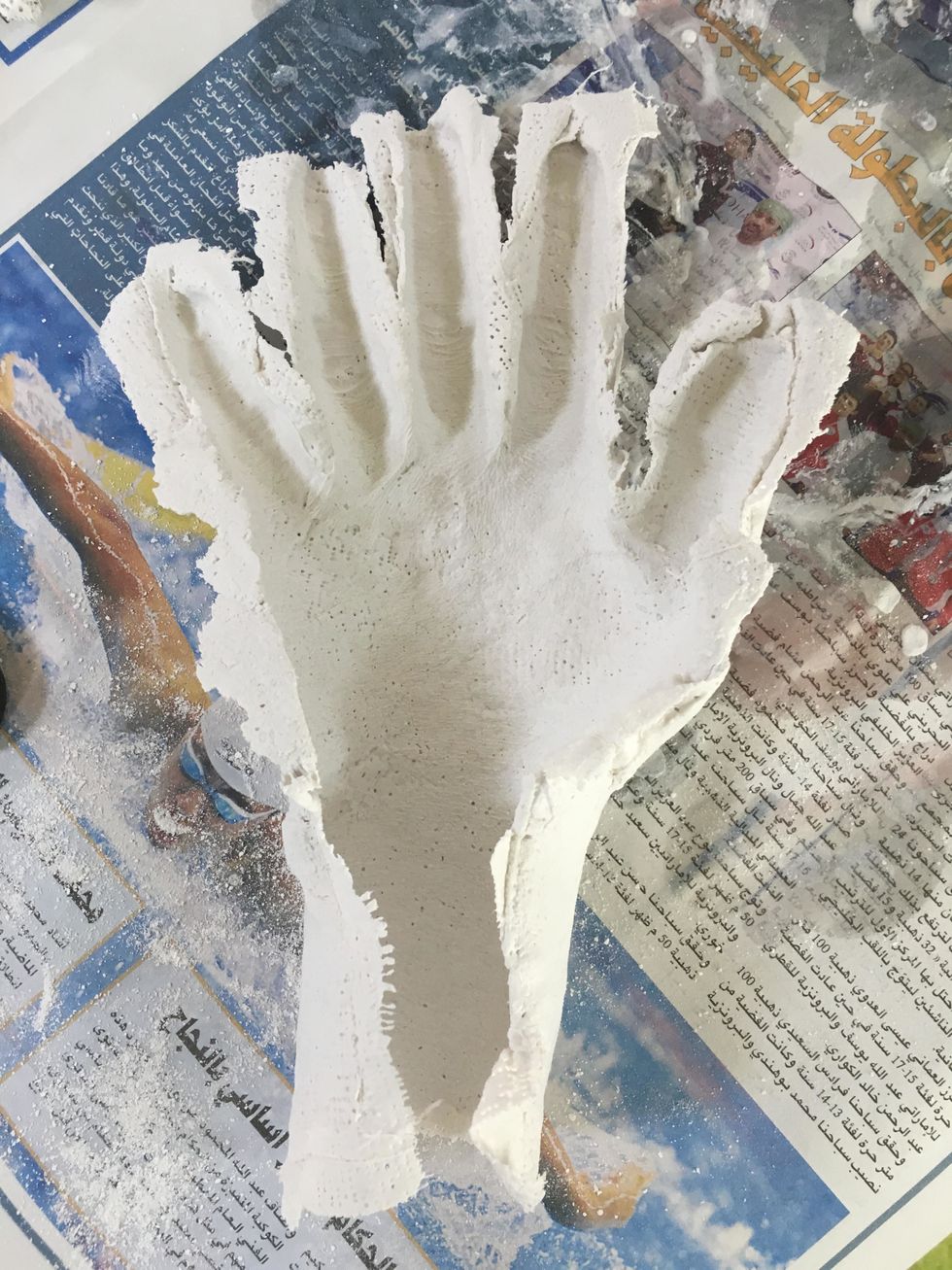 Gently pull off and wiggle your hand out of the cast.
