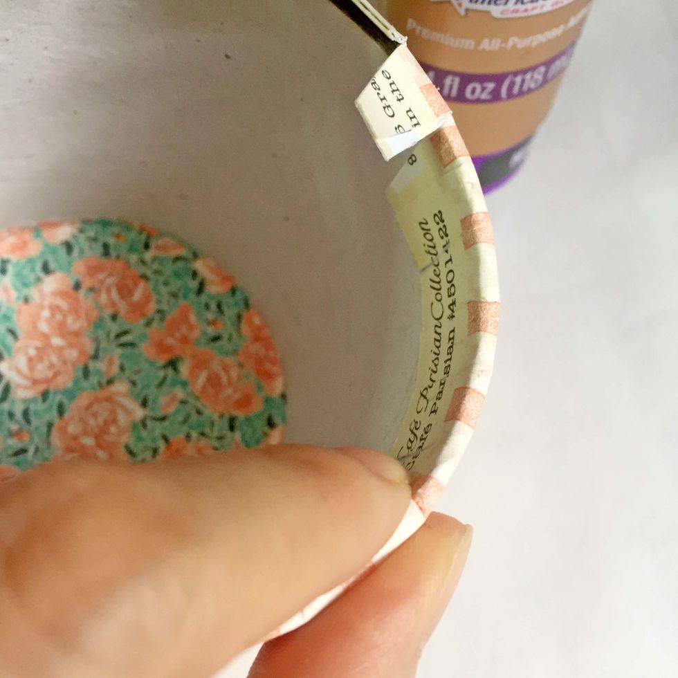 Gently push and glue the tabs down using tacky glue.