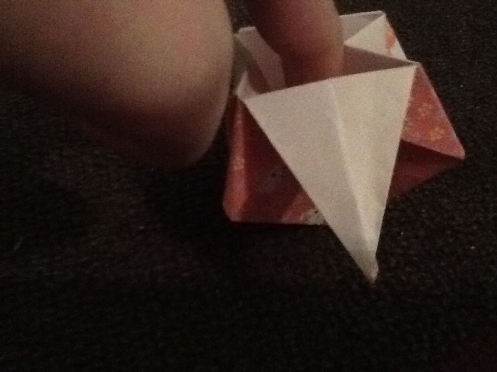 Gently push open the box but carefully do it so you don't rip it