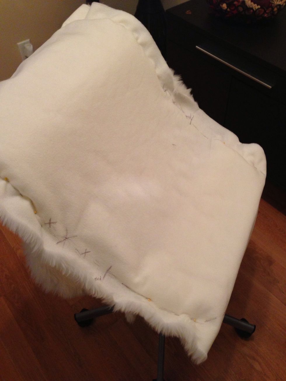 Gently remove the fabric from the chair keeping the pins in tact.