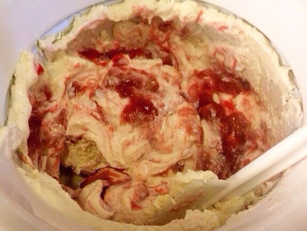 Gently ripple the compote through the ice cream.