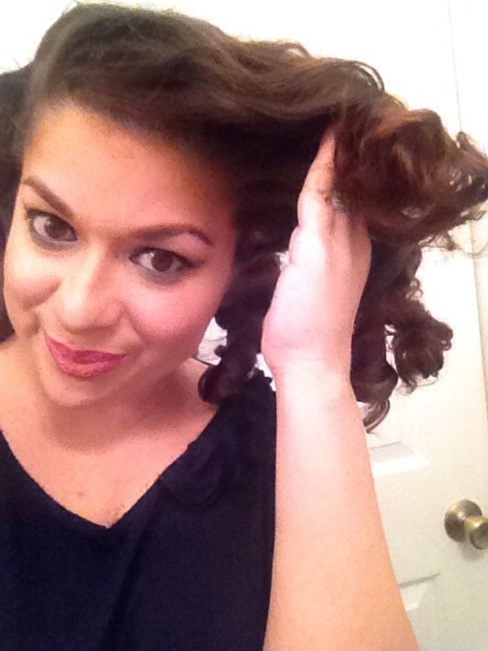 Gently run you fingers through your hair to desperate the curls. For more tamed, relax curls, use a flat paddle brush and continuously brush until the curls are the way you like them.