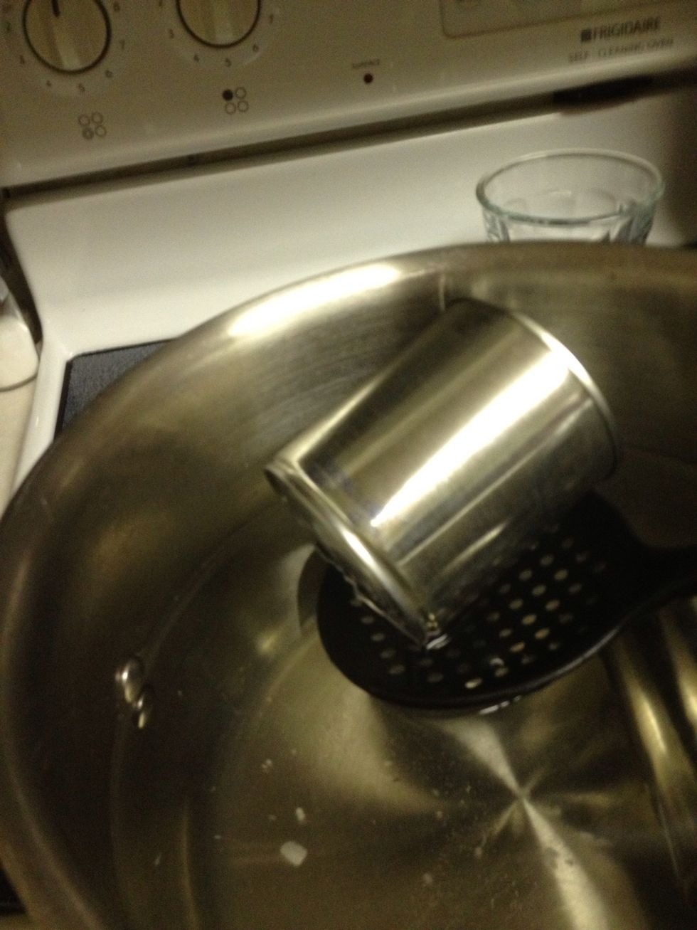 Gently scoop up cans.