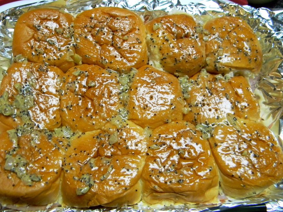 Gently spread remaining onion mixture on top of buns