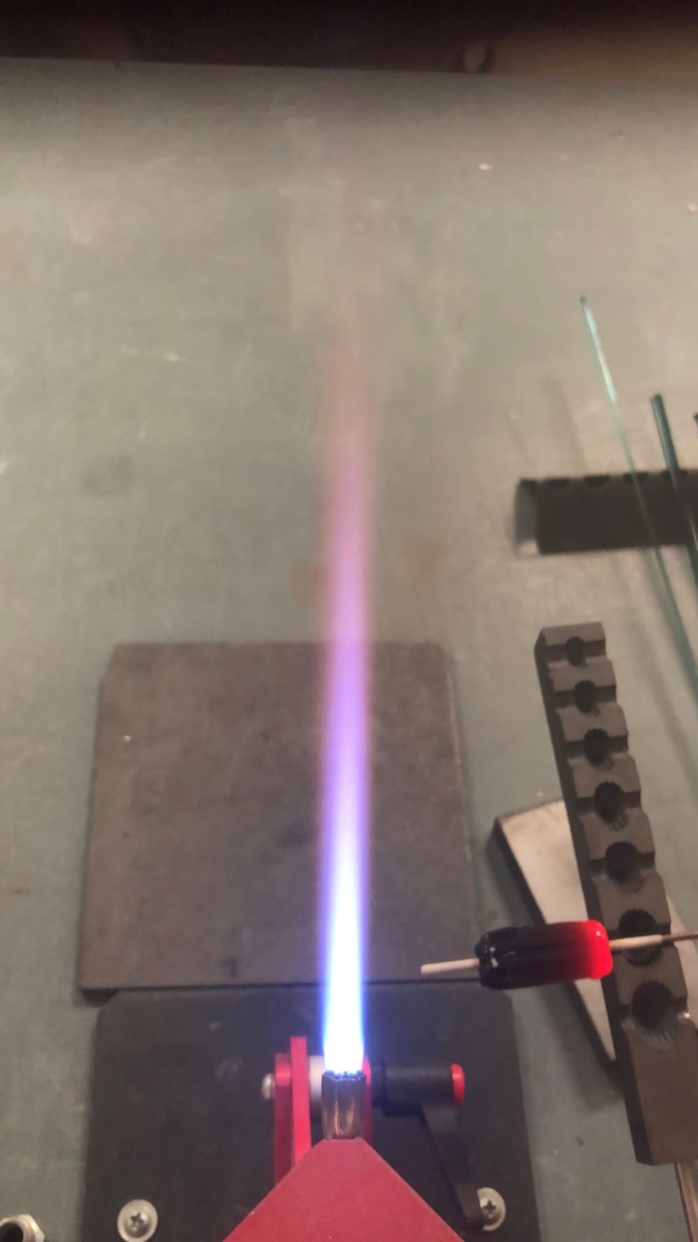 Gently square the end with the edge of a graphite paddle. I like to use a CG beadroller for this.