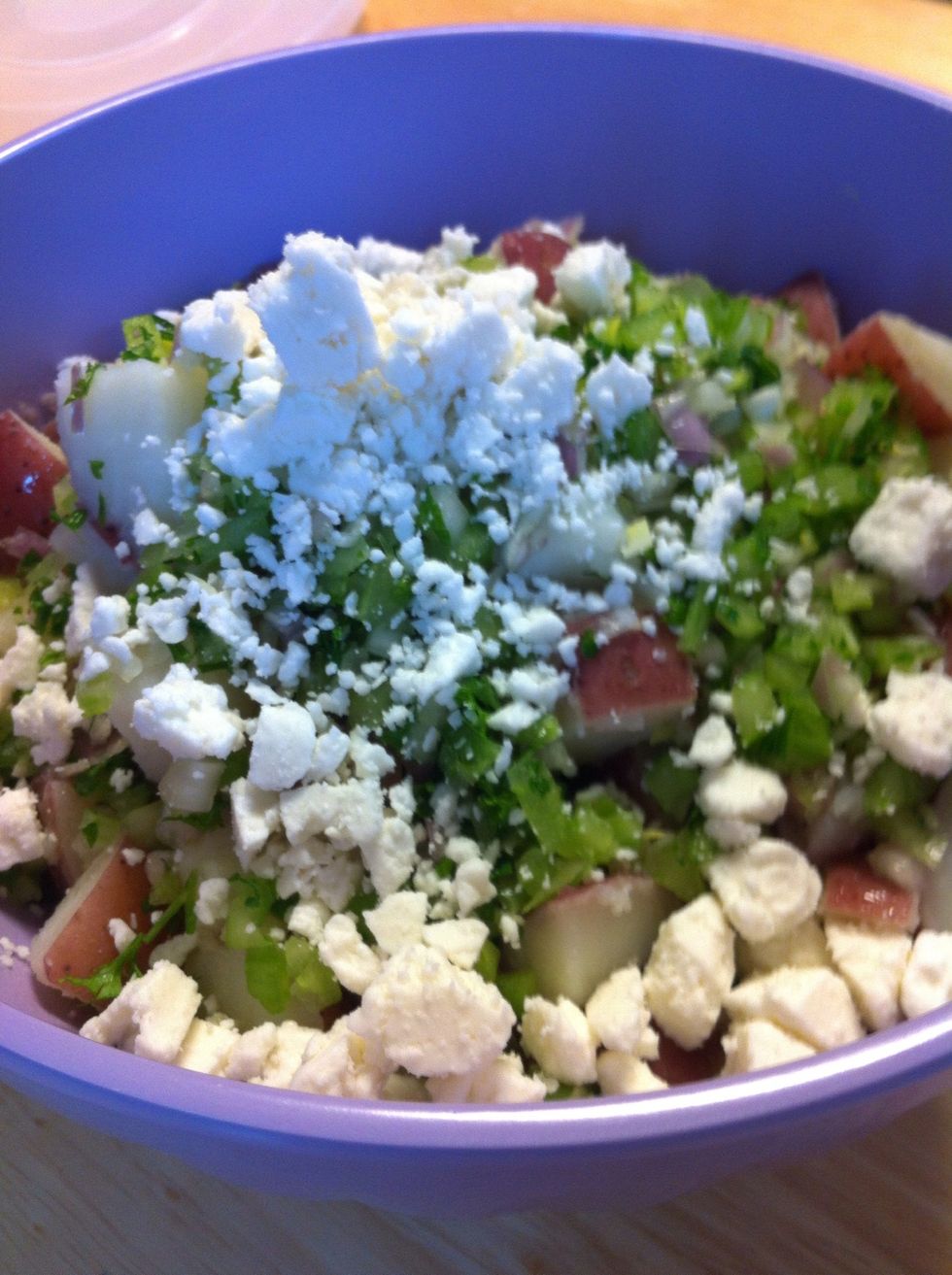 Gently stir in goat cheese, celery, shallot, and parsley. Season with salt and pepper.