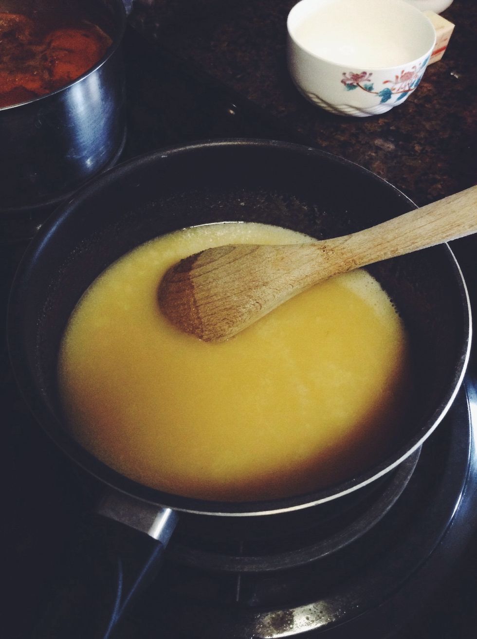 Gently stir the mixture to combine. Leave it on medium heat and bring to a boil. This took about 15 minutes for me. Stir occasionally using a wooden spoon.