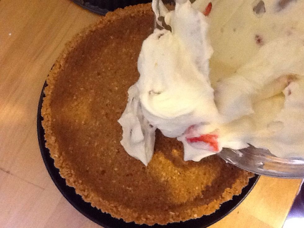 Gently tip the mixture into the tart base and spread it around evenly