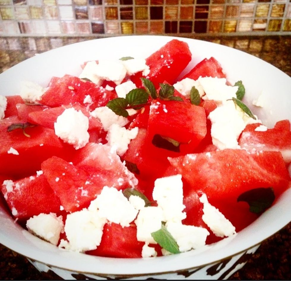 Gently toss the watermelon, feta and mint leaves.