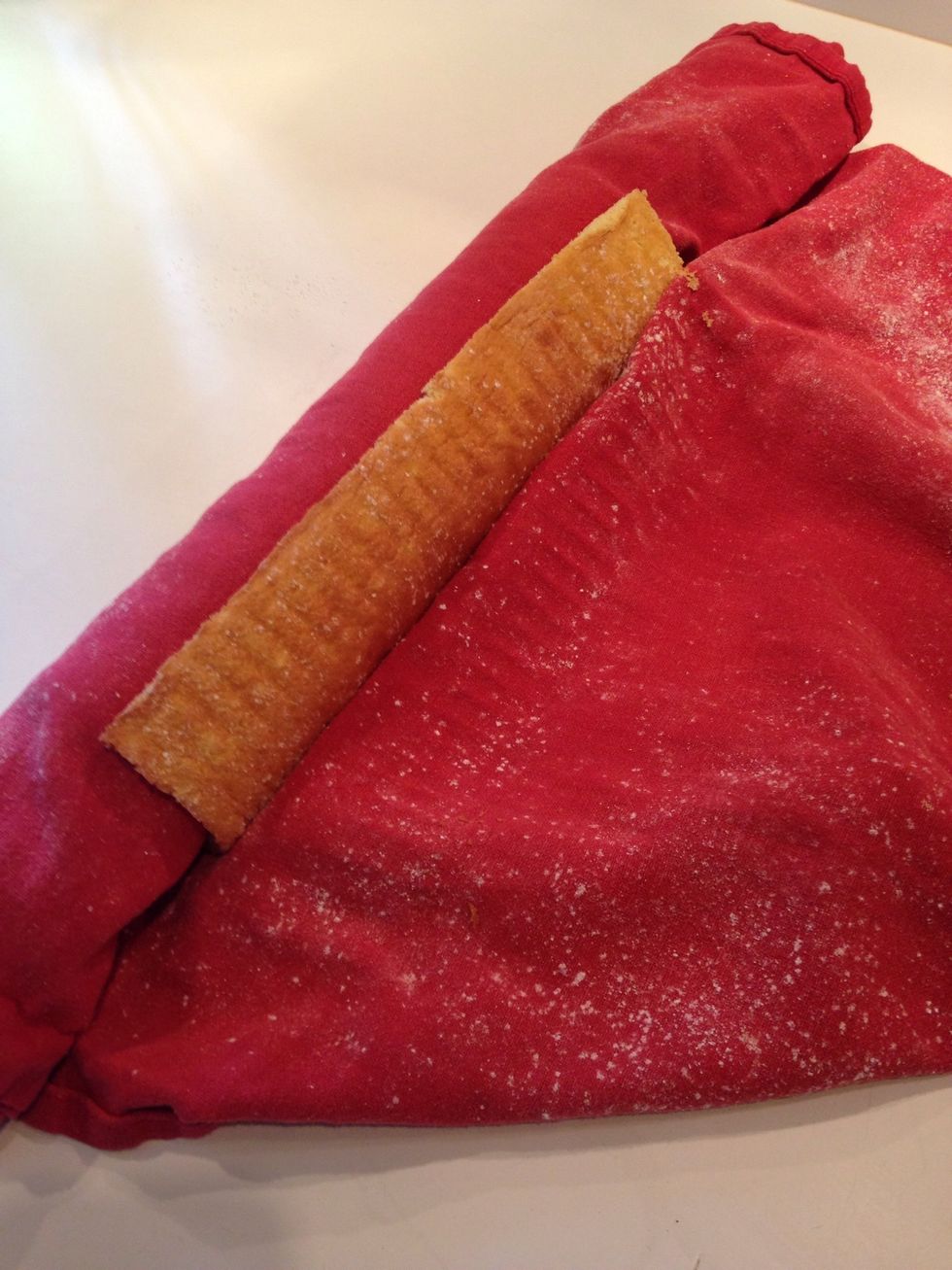 Gently unroll and remove towel, cake will be slightly wavy.