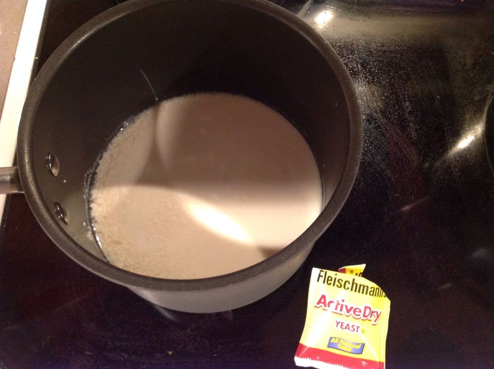 gently warm the milk to 120-130 degrees (in a sauce pan). add the yeast and sugar and whisk. then add buttermilk. whisk and let sit for 5-10 minutes until yeast starts to foam.