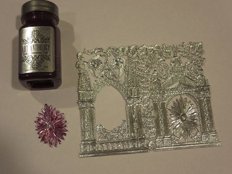 German scrap is foil paper so it needs to be colored with paint instead of ink. I used the same paint as the canvas background.