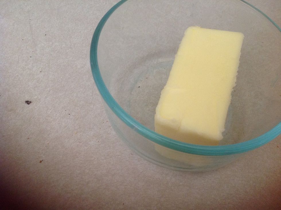 Get 1/2 of butter. Then put it in a bowl.