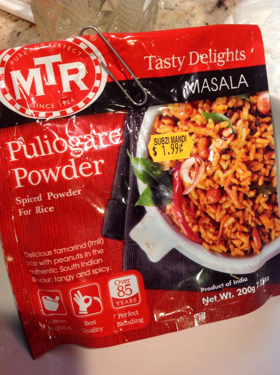 Get 1-2 tbsp Puliogare (Tamarind spice mix) powder.