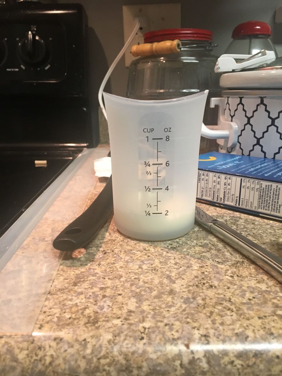 Get 1/4 a cup of milk