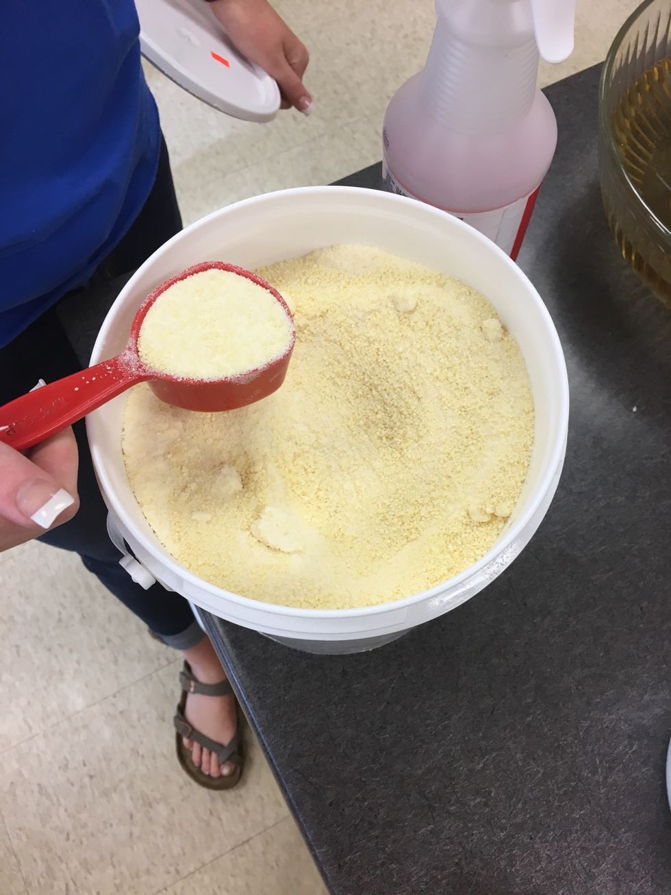 Get 1/4 cup of grated Parmesan cheese