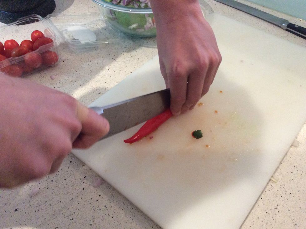 Get 1 chilli and chop it in half going down the middle.