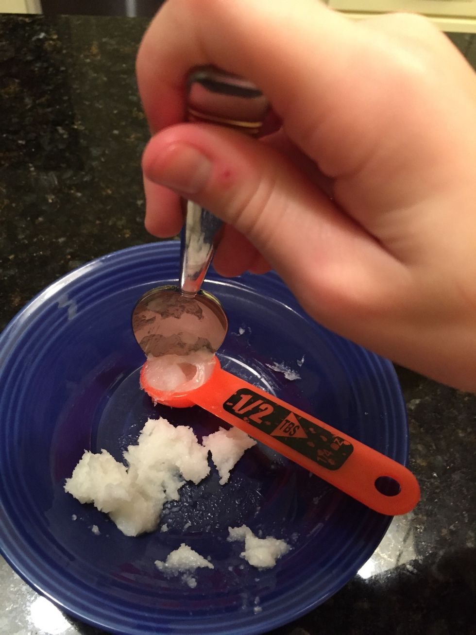 Get 1 tablespoon of petroleum jelly and scoop the excess out with a spoon