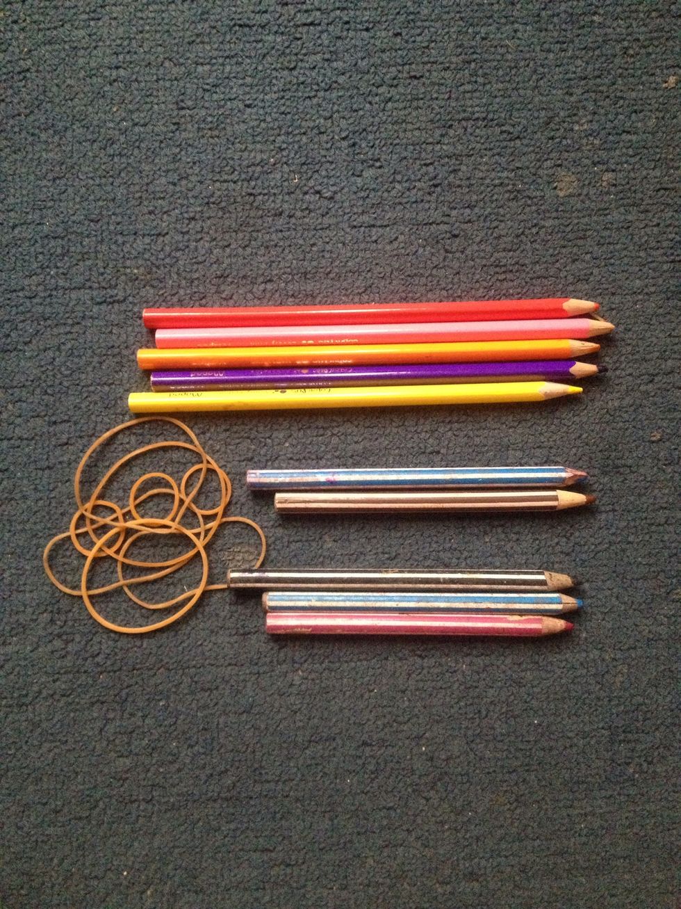 Get 10 pencils and 8 rubber bands .. 5 pencils are long pencils and others are small..