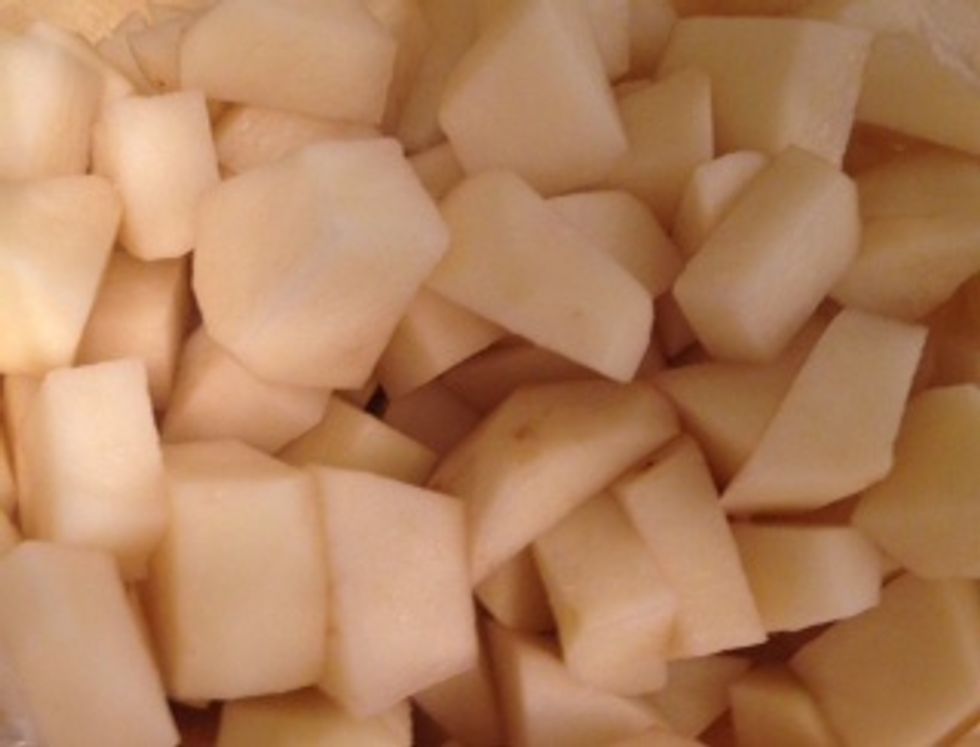 Get 2 lbs of potatoes. Skin and cut into 1 inch pieces. If you like the skins, just leave them on and cut into pieces.