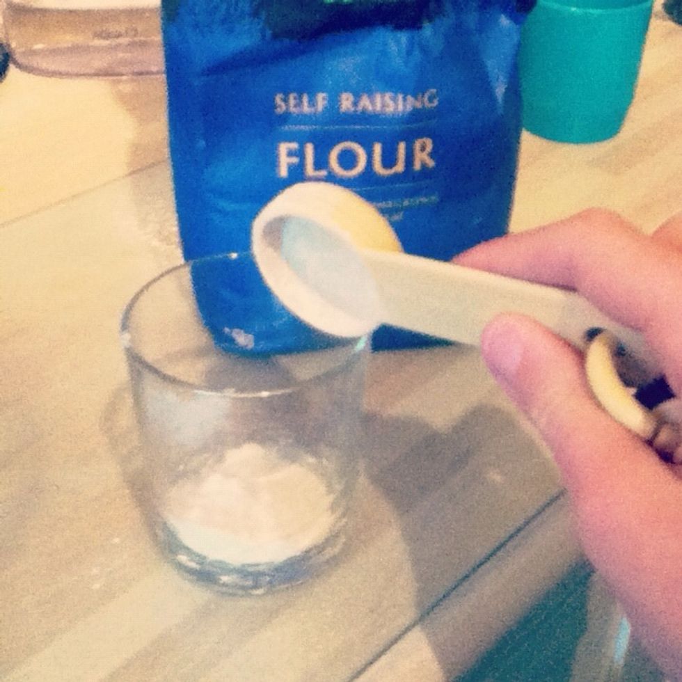get 3/4 tablespoons of flour (I poured it into a different cup to then pour into the mug)