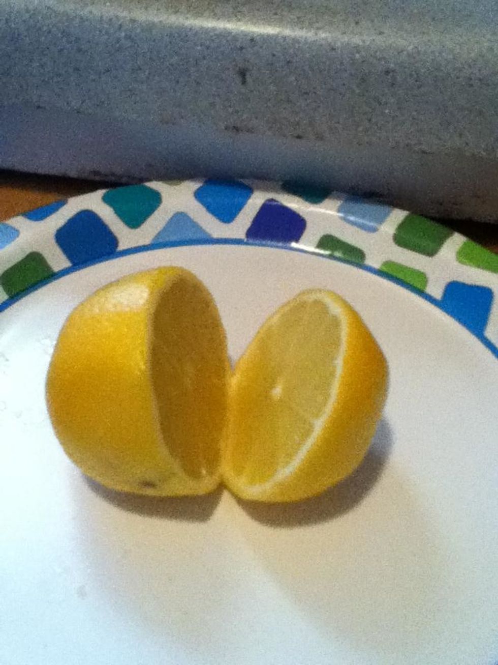 Get 3 lemons and cut them in to halves.