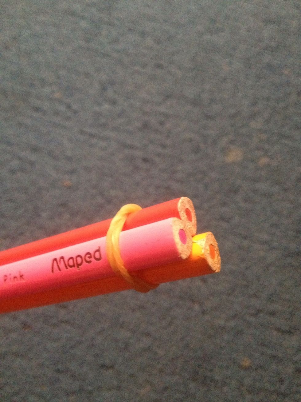 Get 3 long pencils and tie like this..
