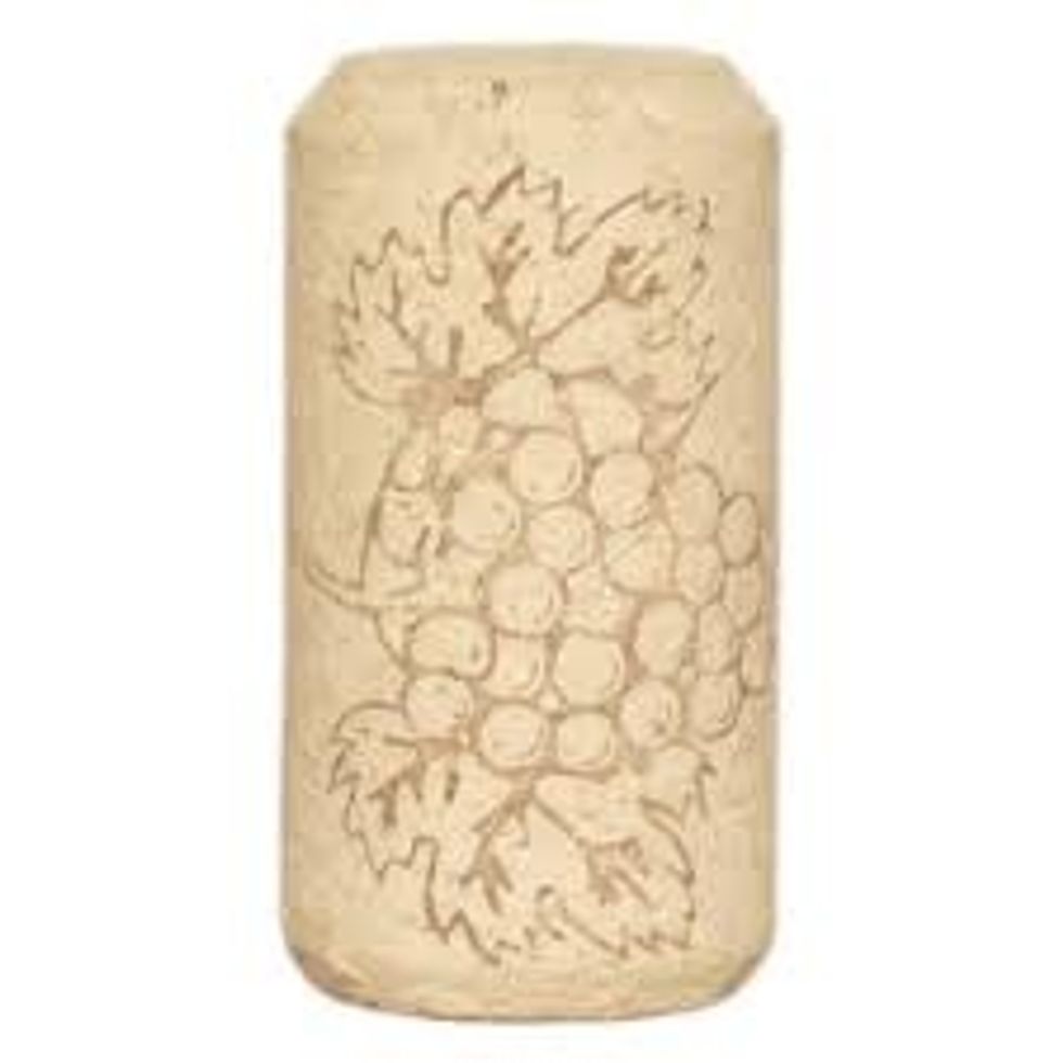 get 4 corks you do not have to have a design it would be better not to have a design.