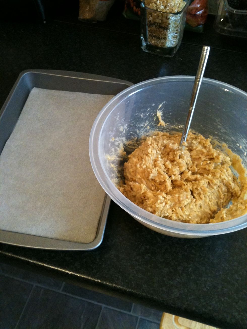 Get a baking tray ready. Line with baking parchment. This is the final mix you are looking for after you have stirred in the egg.