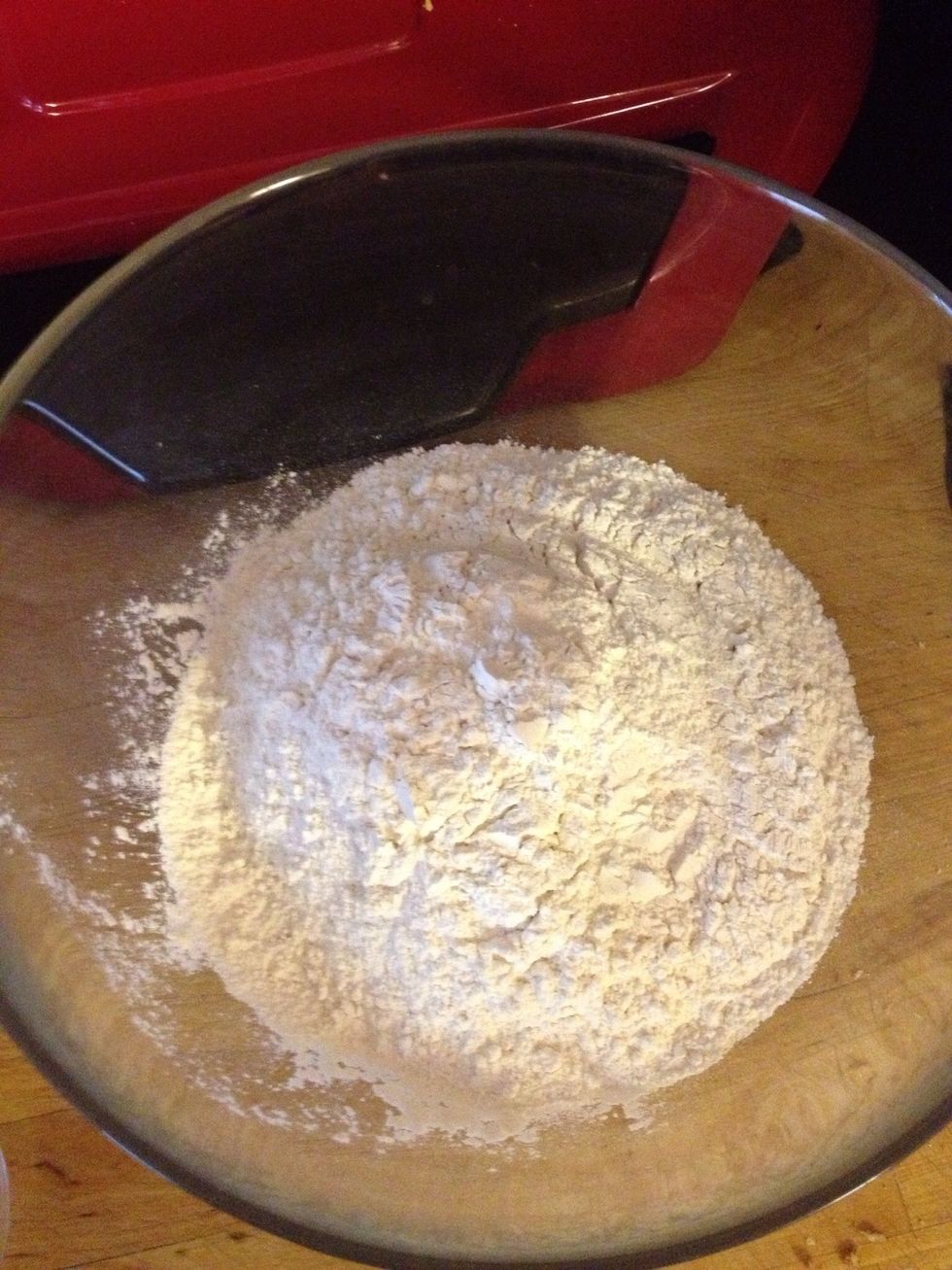 Get a big bowl and add all of your ingredients except the water.