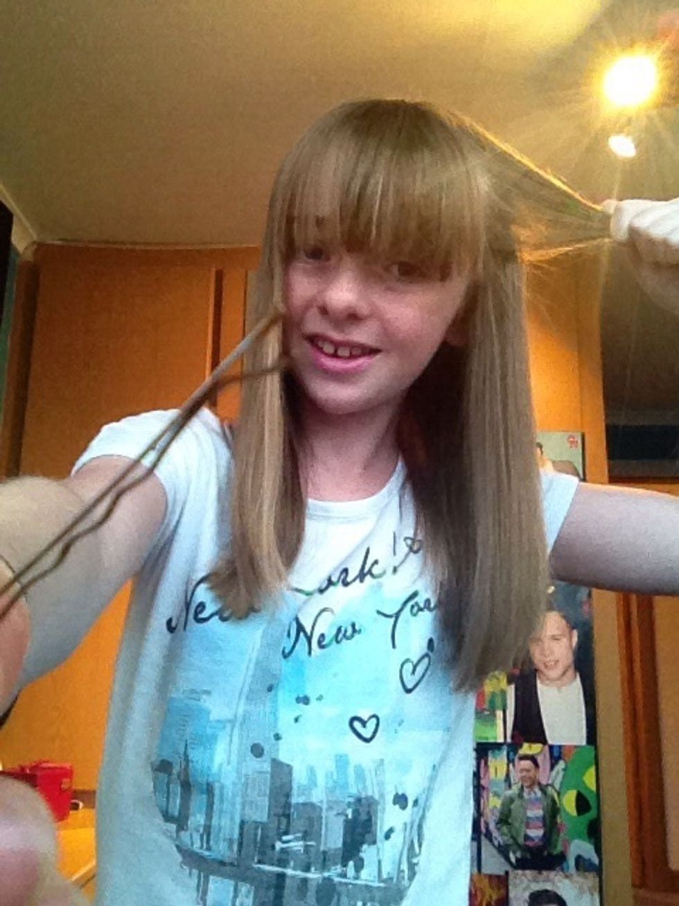 Get a Bobby pin and shove it in..