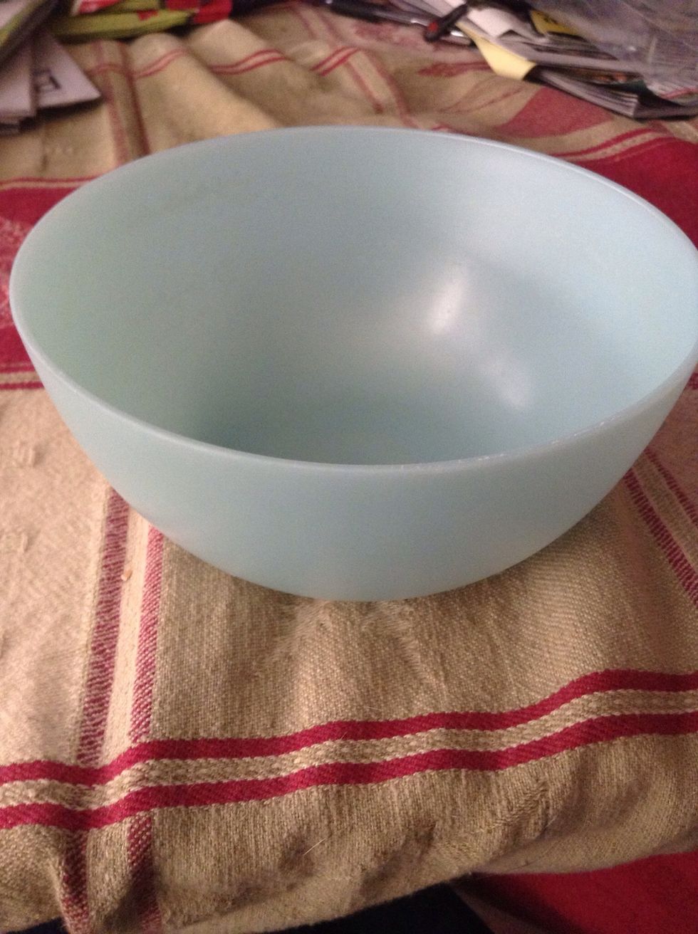 Get a bowl and set it down on your table/flat surface.