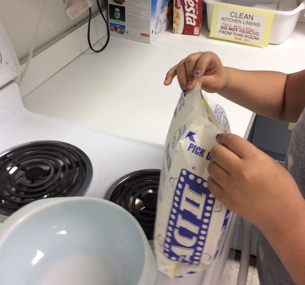 Get a bowl to put the popcorn in.