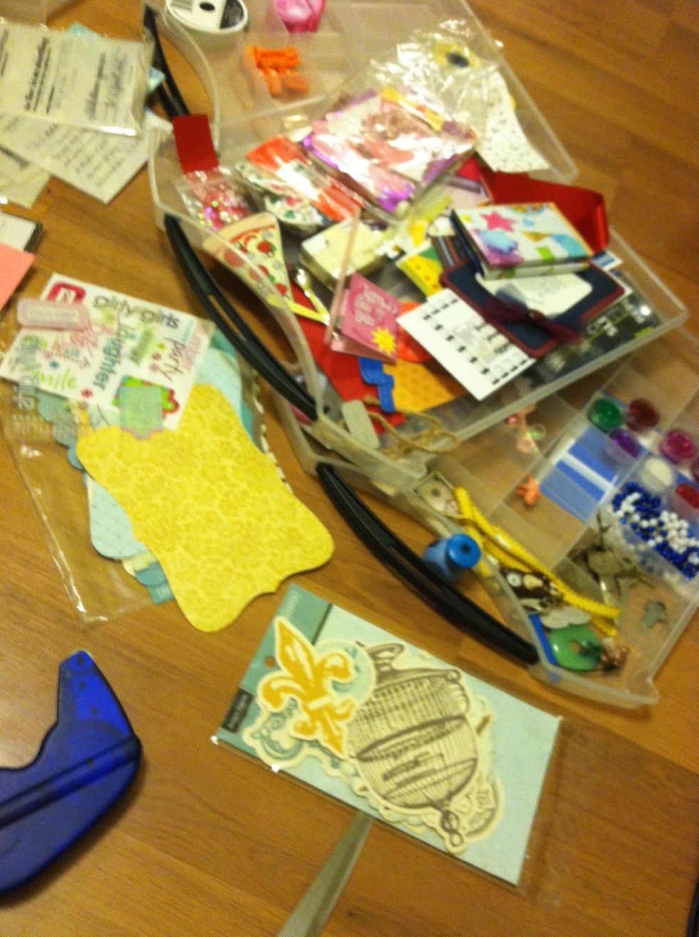 Get a bunch of stuff! Stickers, old keys or scraps of paper, rub on sentiments,glitter , etc.