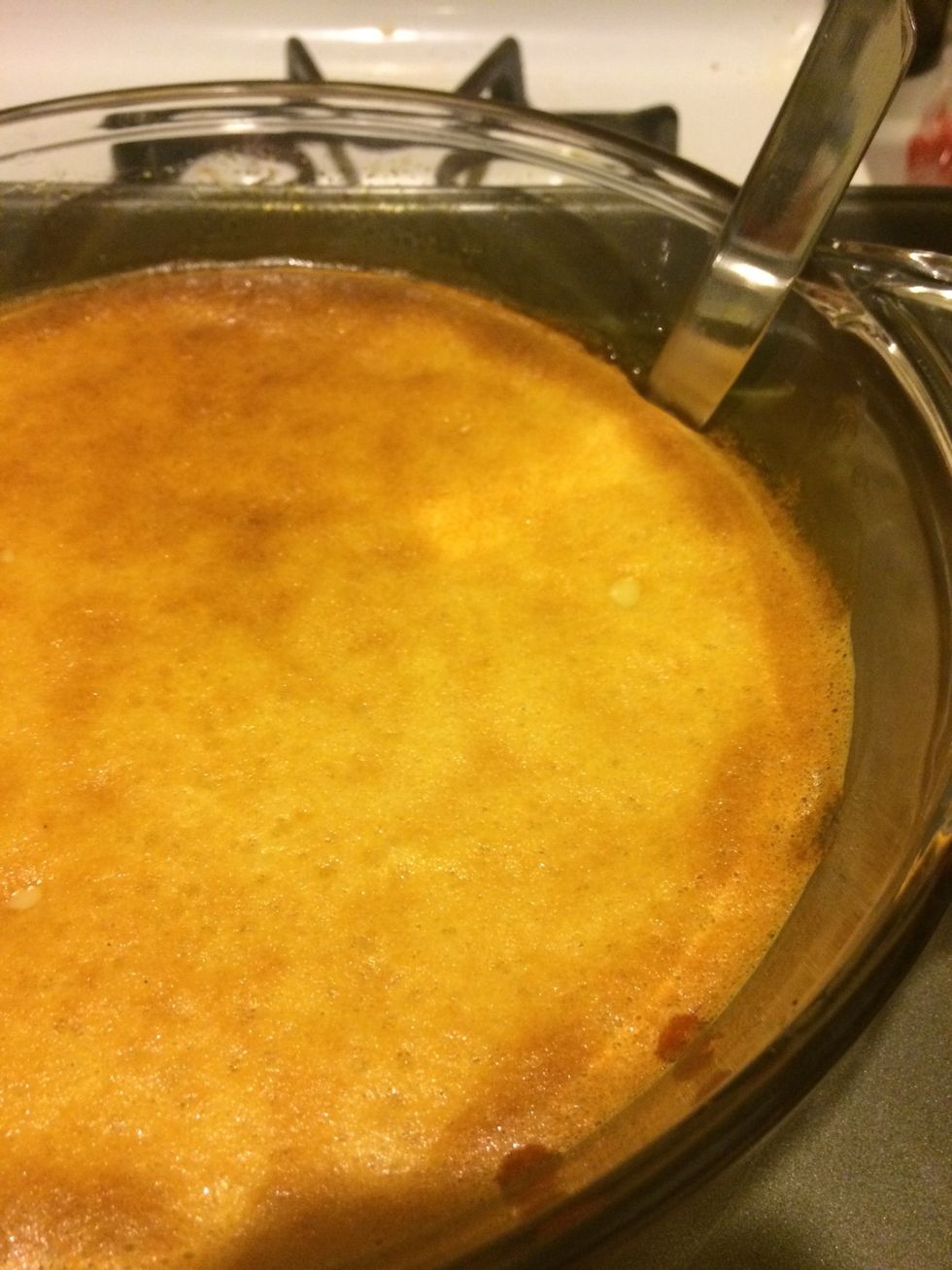 Get a butter knife and carefully go along the edge of the flan to separate it from the baking dish (all the way around)