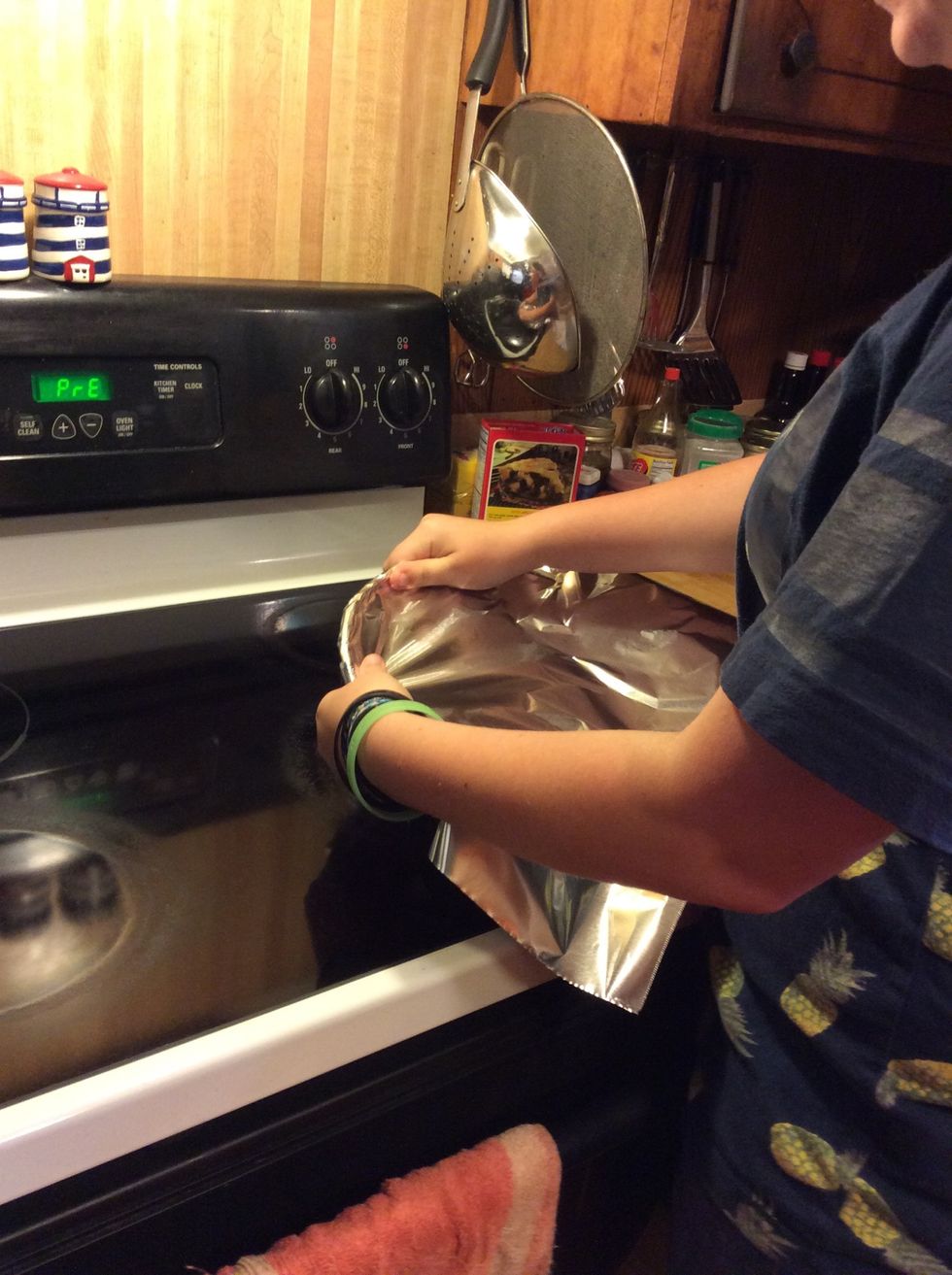 Get a circular pan and wrap with tin foil