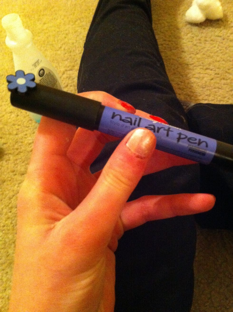 Get a dark nail art pen. I'm using Sally Hansen's periwinkle nail art pen. (This is not sponsored by Sally Hansen beauty products in any sort of way)