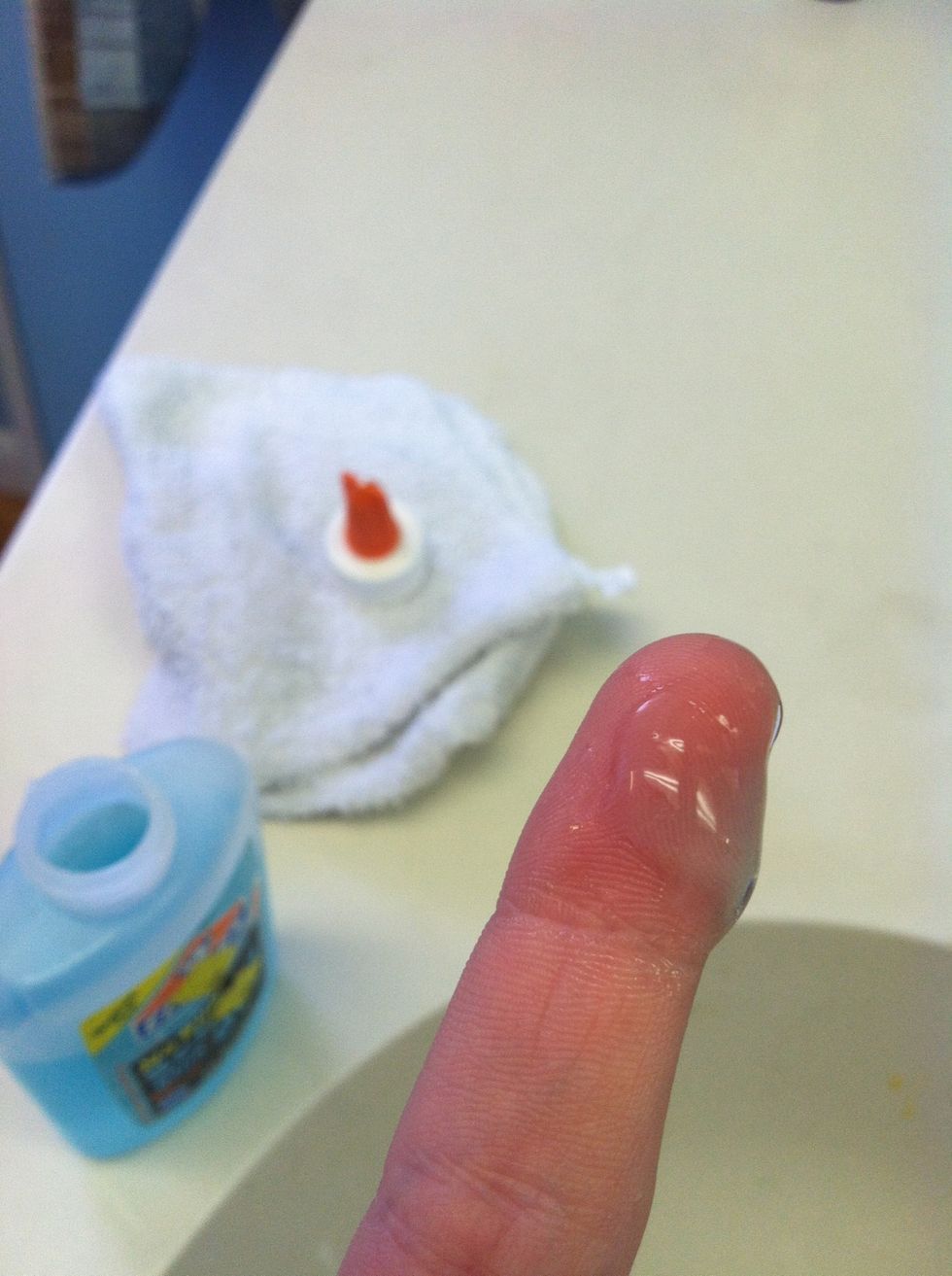 Get a good amount of glue on your finger tip.