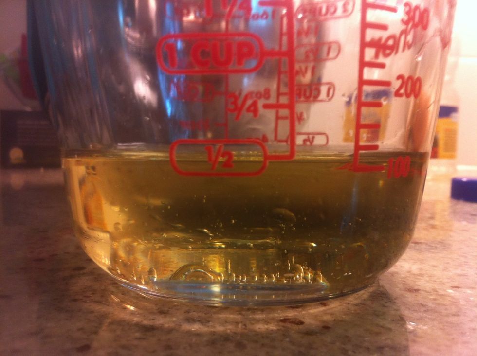 Get a half cup of olive oil