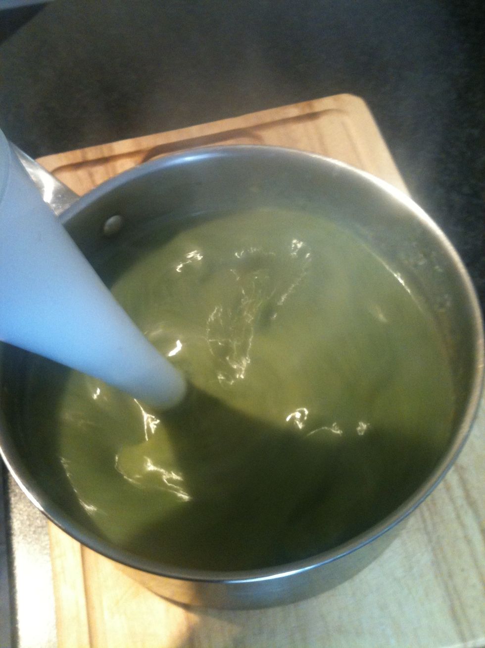 Get a hand blender or a normal blender and blend into a smooth soup.