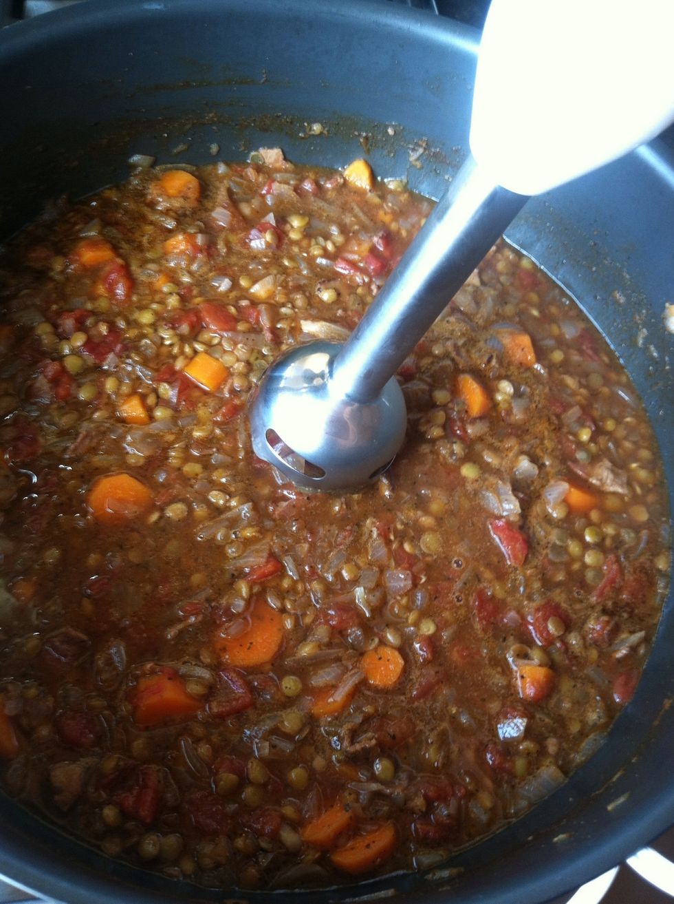 Get a hand emulsifier and depending on how smooth or chunky you want your soup- pur\u00e9e to desired texture. You can also use a blender