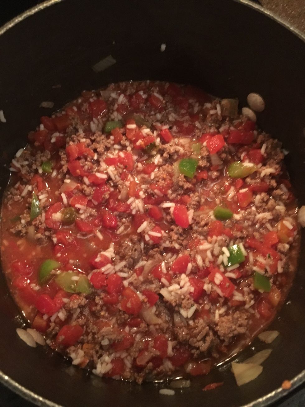 Get a large pot and add the meat, broths and tomatoes together and let it simmer on low heat.
