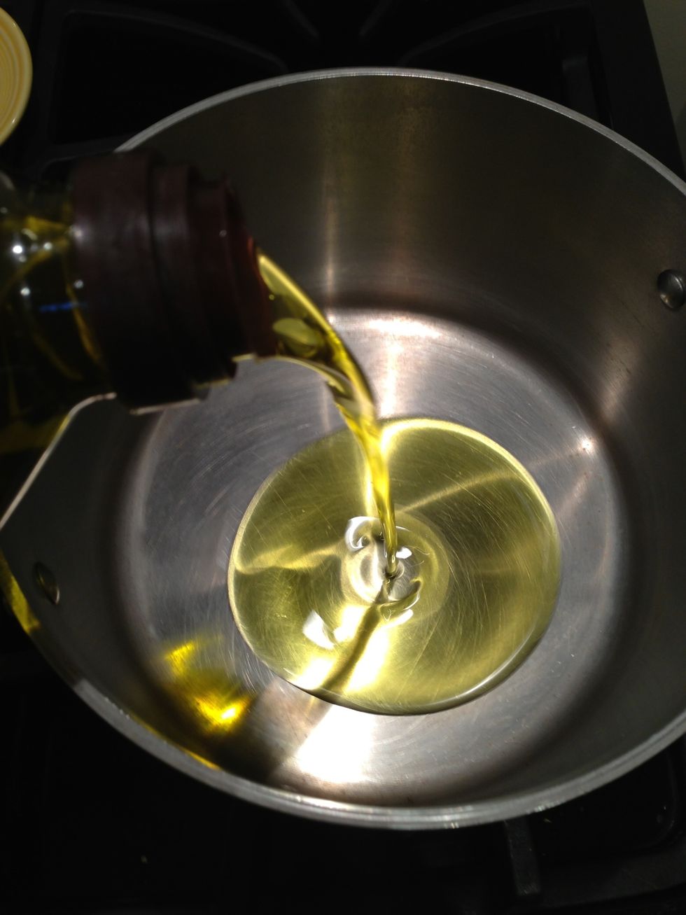 Get a large soup pot and add about 6 tablespoons of olive oil and heat on medium-low heat.