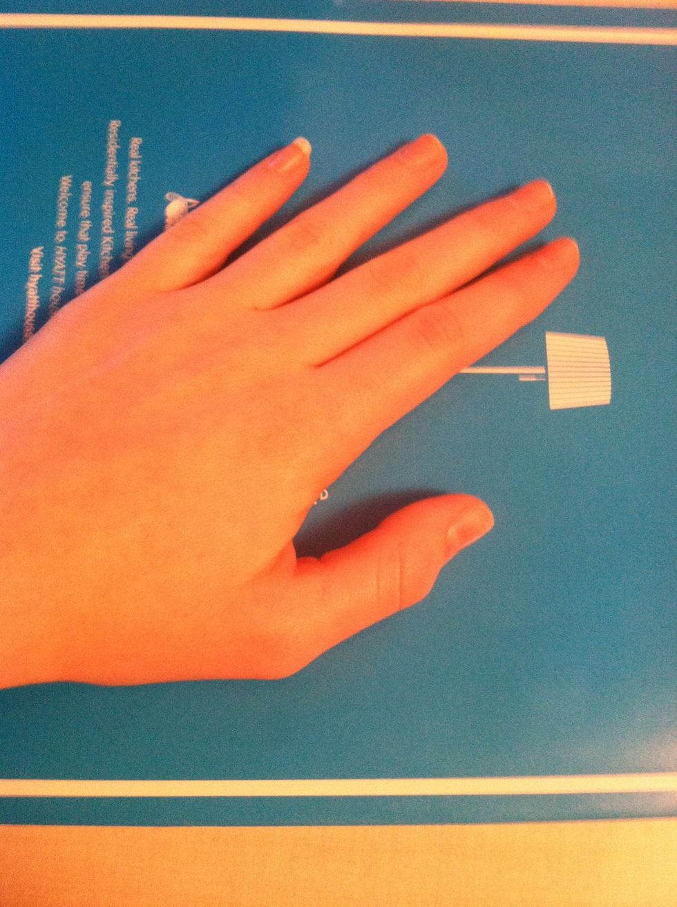 Get a magazine to paint on so as not to create a mess.